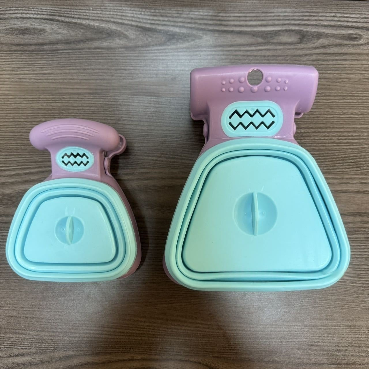 Small and large poop scooper size comparison