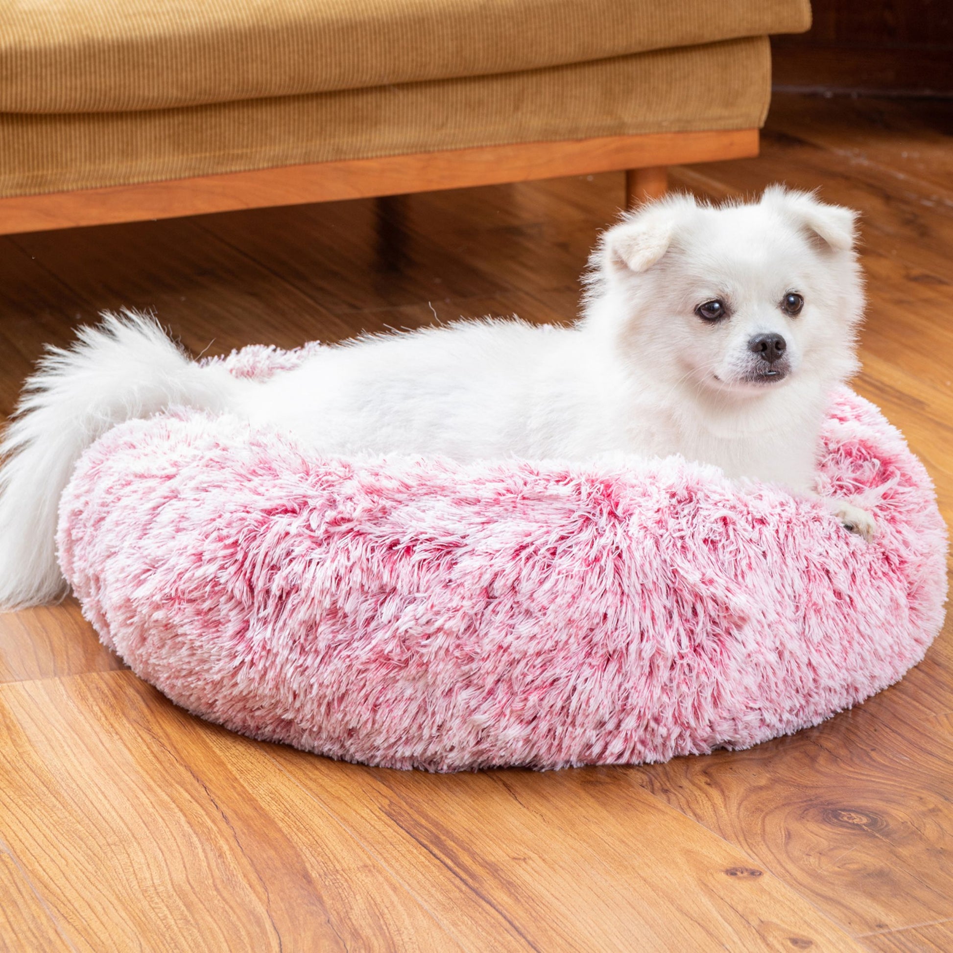 Machine washable cover on fluffy donut pet bed