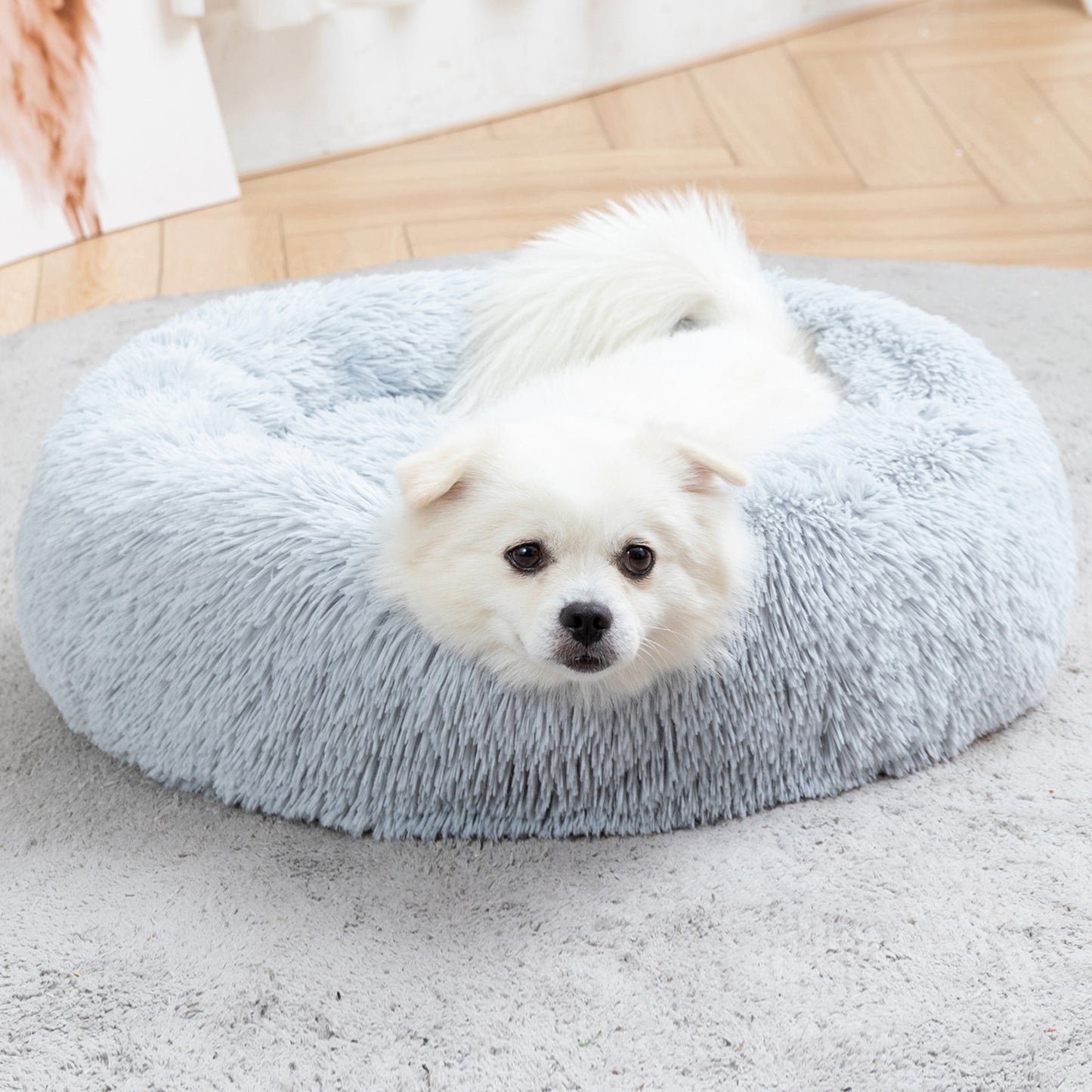 Close-up of long plush fabric on donut pet bed