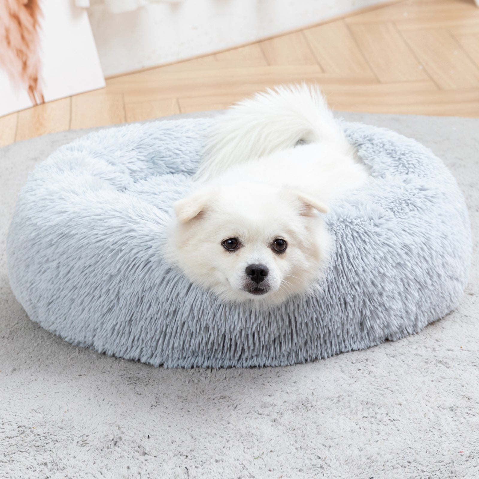 Close-up of long plush fabric on donut pet bed